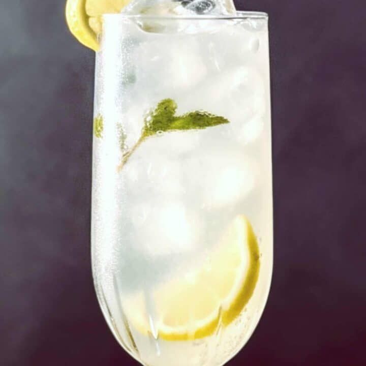 St-Germain Spritz in glass with lemon slice and mint