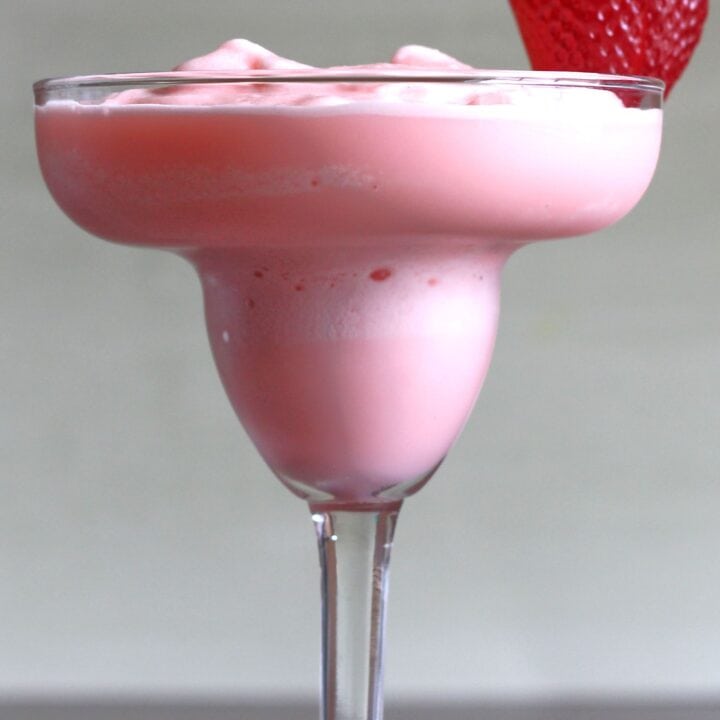 Strawberry-Banana Margarita with strawberry on rim