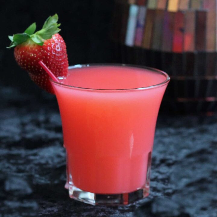 Strawberry Blonde drink with strawberry garnish