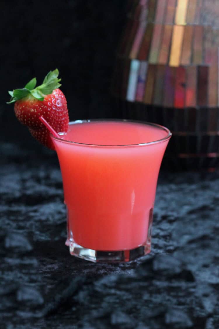 Strawberry Blonde drink with strawberry garnish