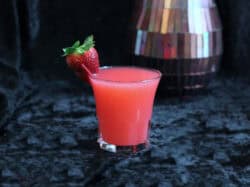 Strawberry Blonde drink with strawberry garnish