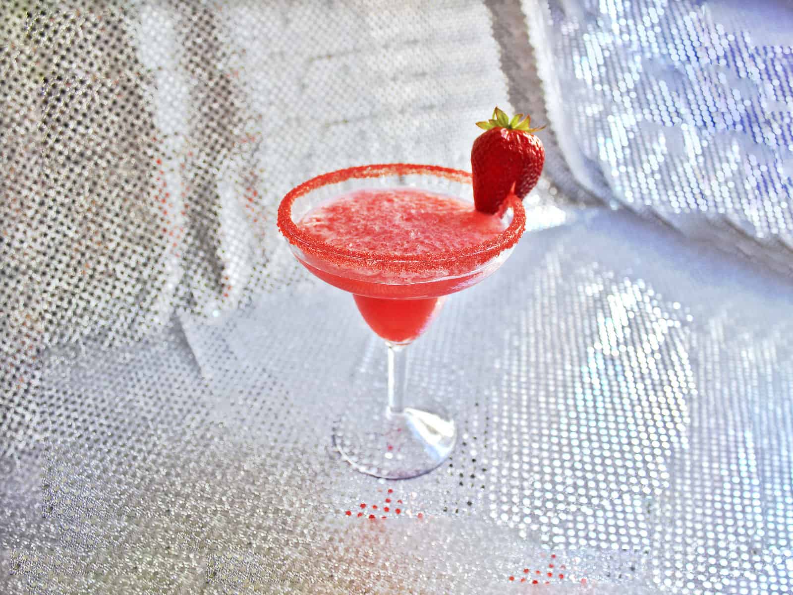 Strawberry Margarita with pink sugar rim