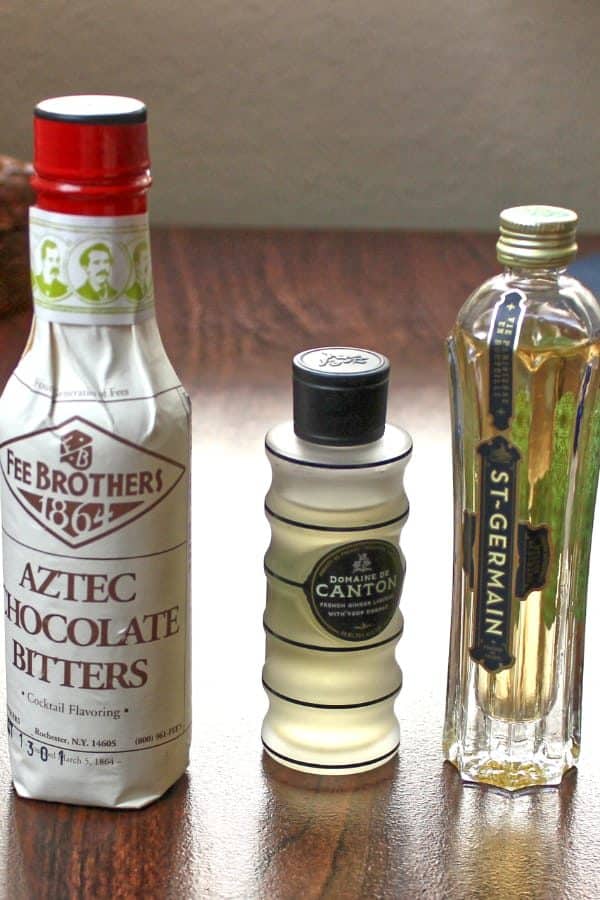 Bottles of Aztec Chocolate Bitters, Canton Ginger Liqueur, St. Germain Elderflower Liqueur