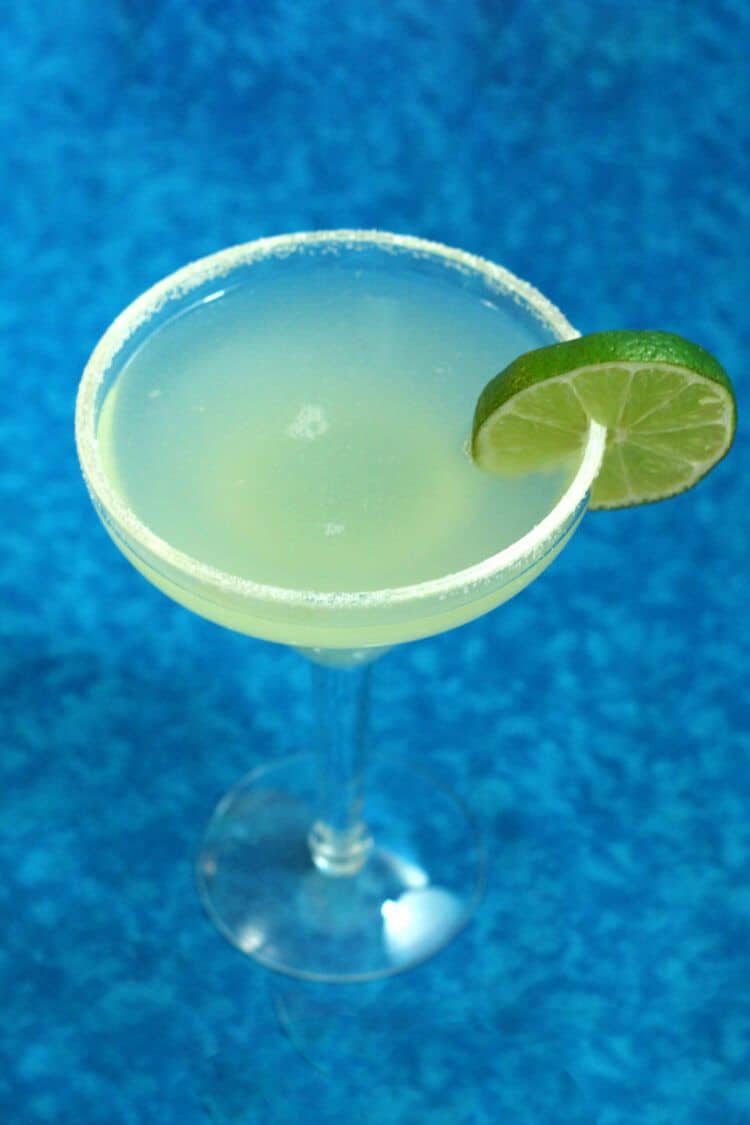 Top Shelf Margarita with lime wheel and salt rim