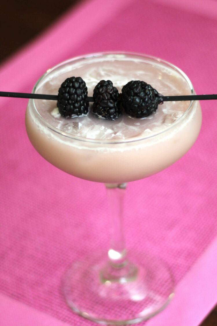 Tilted angle view of Urban Jungle drink with blackberries