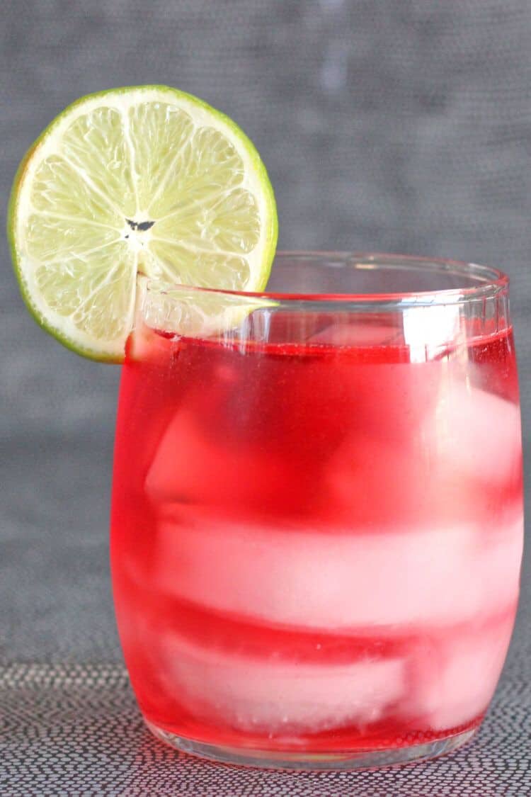 Vodka Cranberry drink with lime garnish