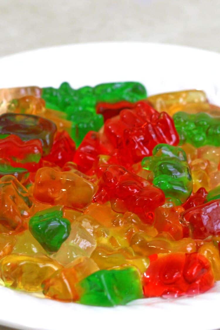 Vodka gummy bears on a white plate