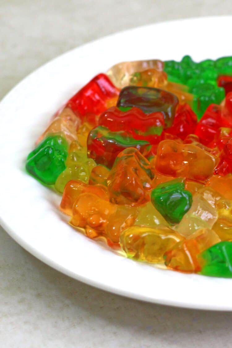 Vodka gummy bears on white plate and ready to serve