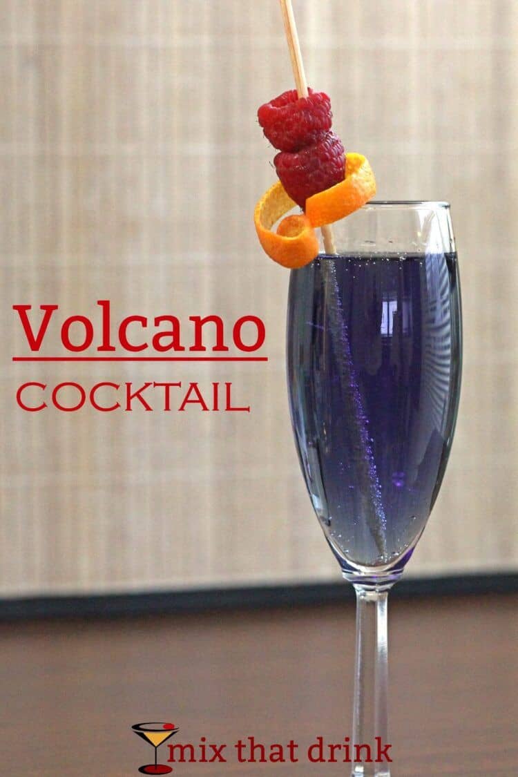 Volcano drink garnished with raspberries